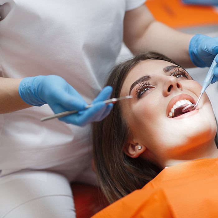 A woman about to receive a dental checkup